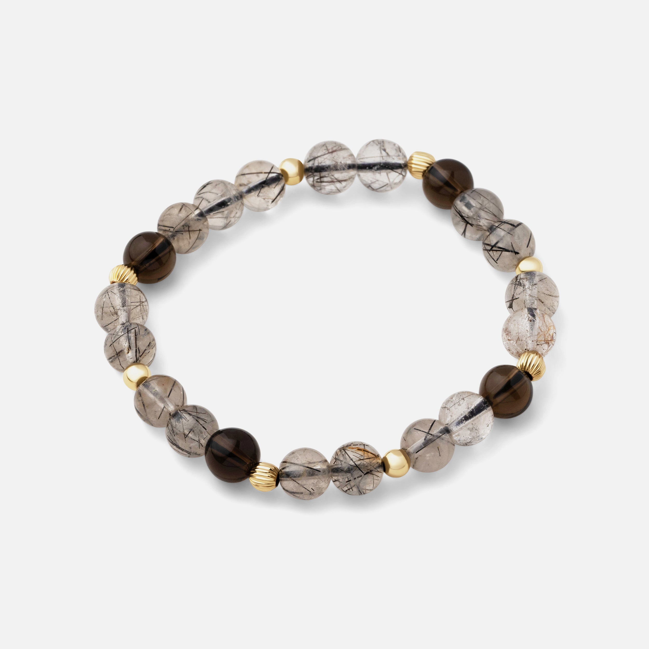 Bracelet featuring tiny needles of black rutiles beautifully arrayed in black rutile quartz, paired with clear dark brown smoky quartz for a classic style. Can be worn alone or layered with other gold pieces.