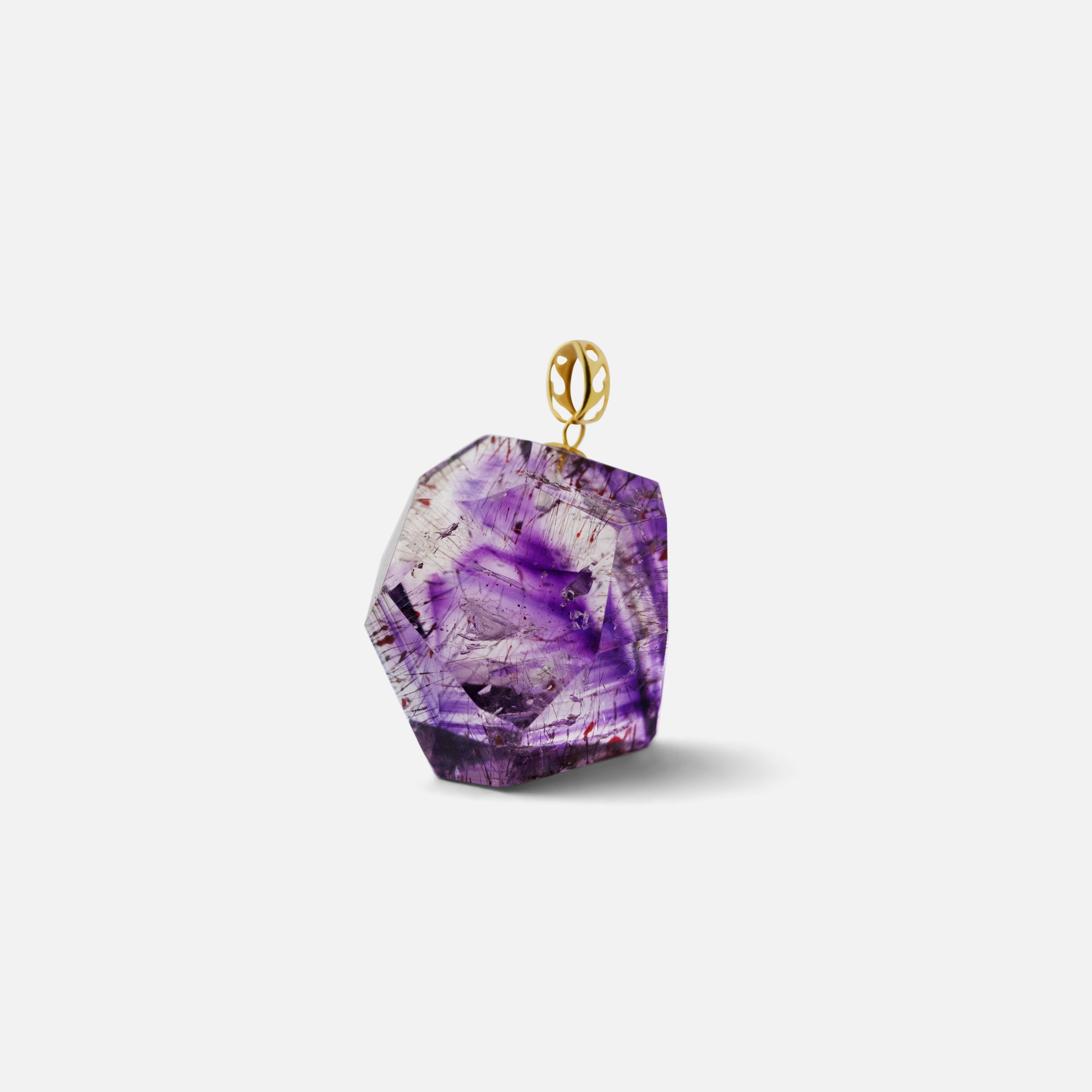 Pendant featuring beautiful purple rutilated inclusions of the super 7 gemstone, elegant and timeless, perfect for layering with other gold necklaces.