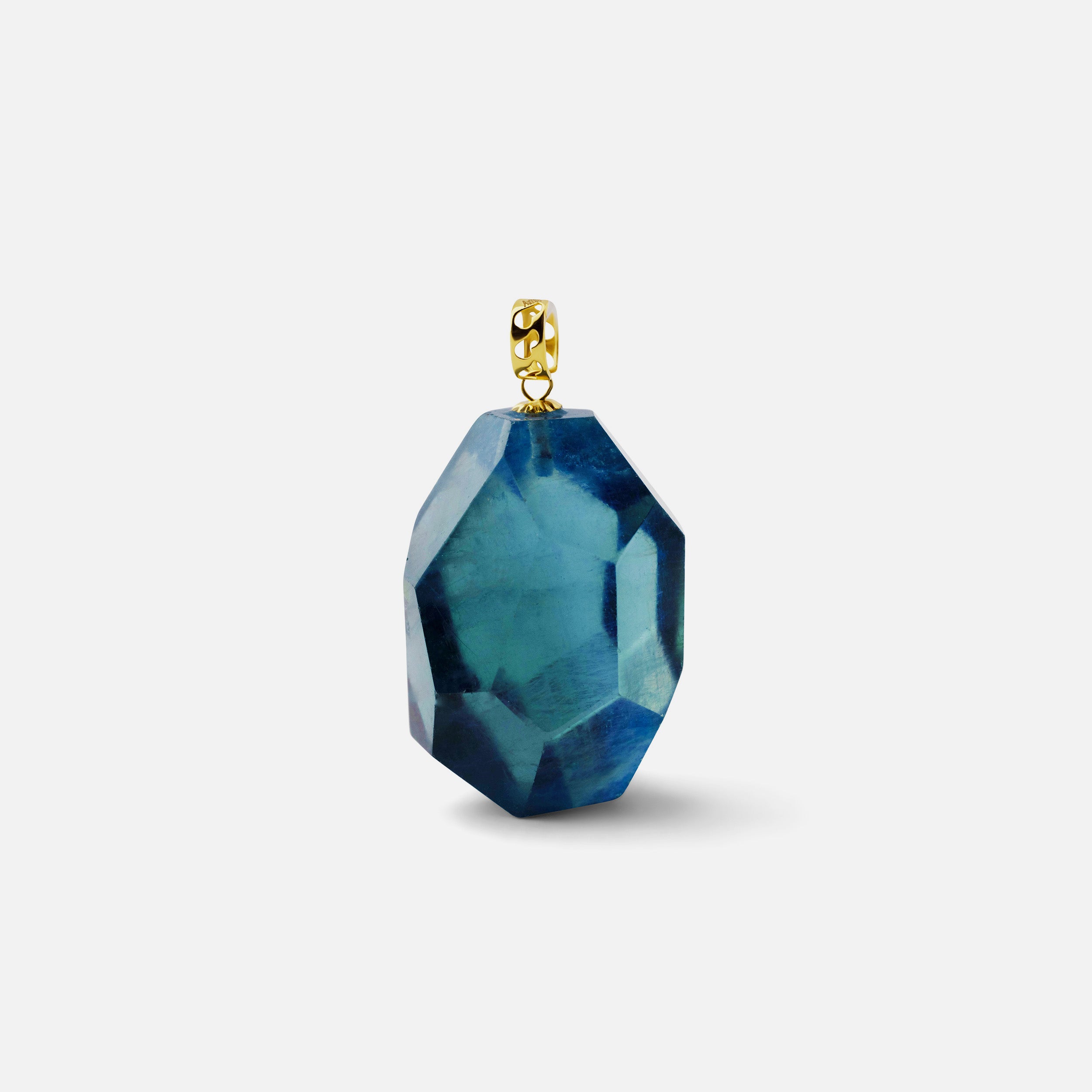 Pendant featuring deep blue aquamarine with an 18K solid gold clasp, showcasing its glacial beauty. Perfect for any occasion, it can be worn solo or stacked with other gold jewelry.